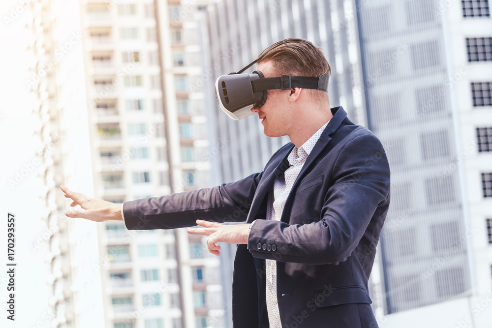 Young man enjoy with virtual reality glasses Young man enjoy with virtual reality glasses