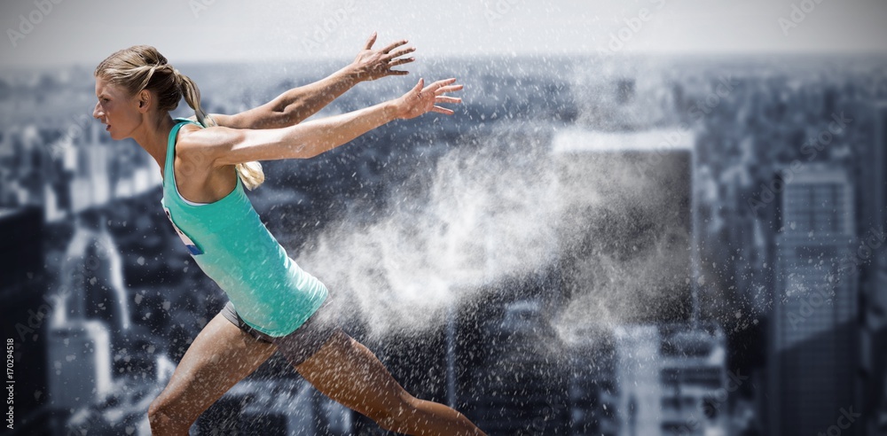 Composite image of sportswoman finishing her run Composite image of sportswoman finishing her run