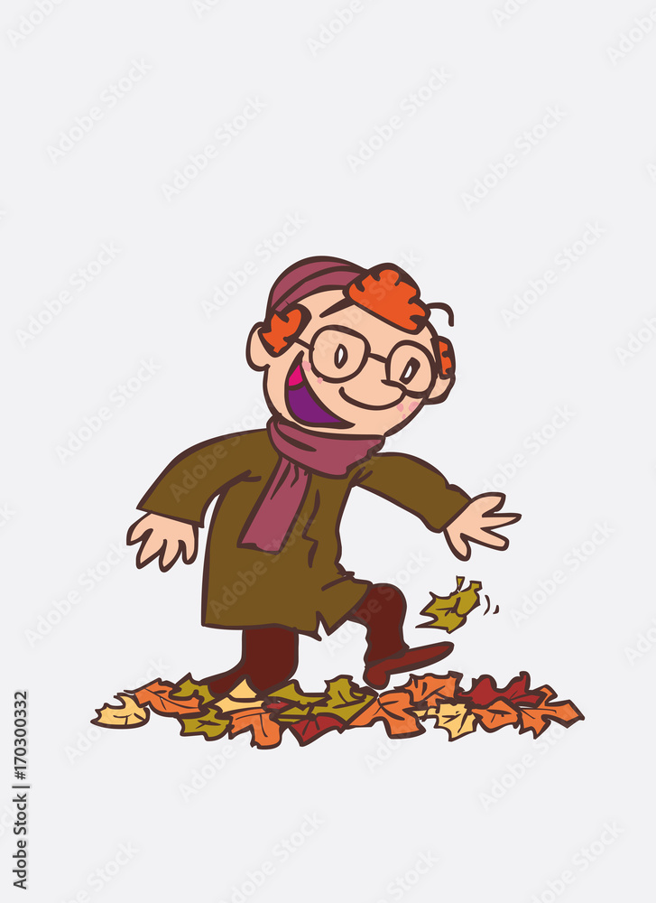Obraz premium red hair child having fun treading autumn leaves. Character of boy, funny style, isolated.