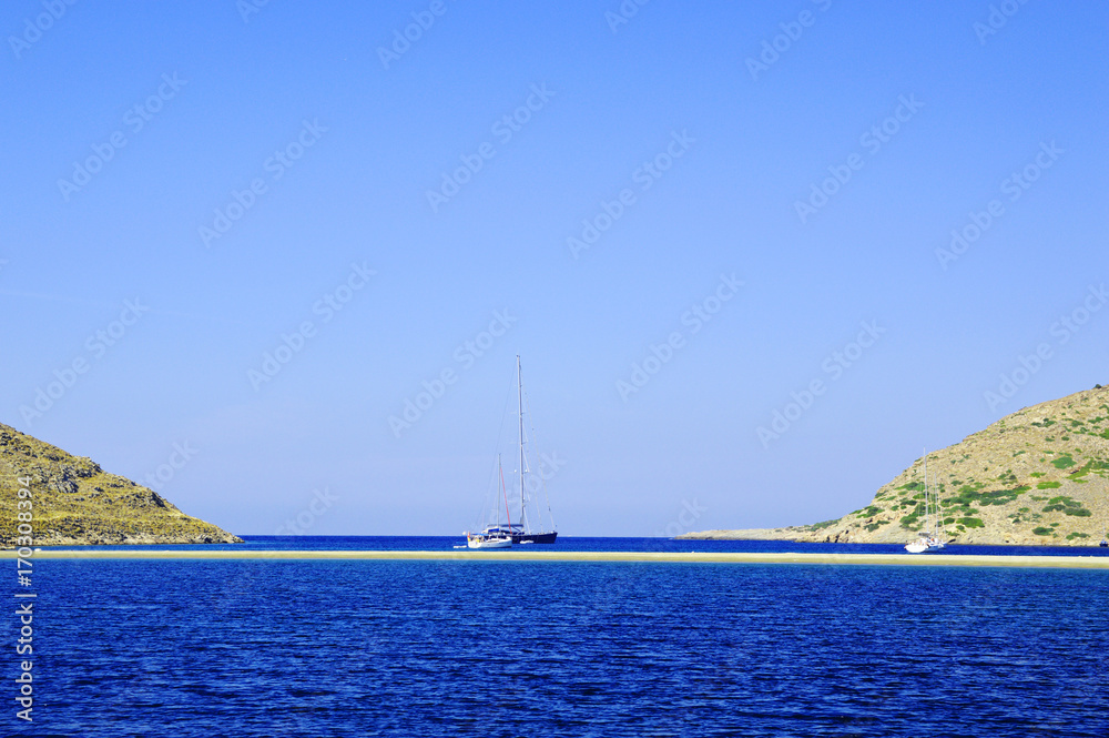 yachting, boat on sea between two shores