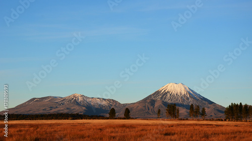 Sunset in mountains of Tongariro National Park in New Zealand photo