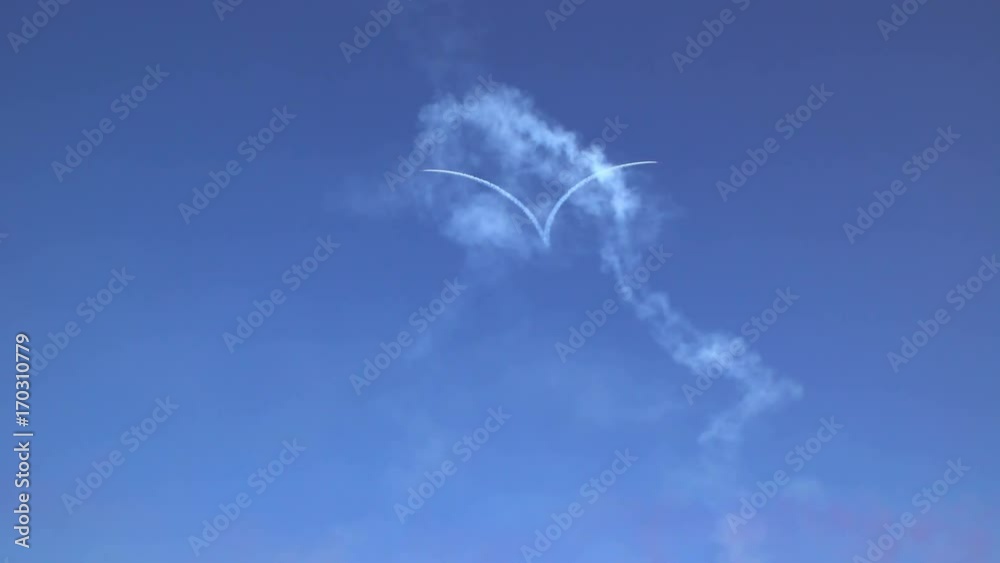 Aerobatic Team draws Heart shape in the sky during airshow Aerobatic Team draws Heart shape in the sky during airshow