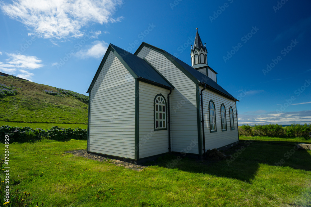 Iceland - Ancient church building of blonduos chapel on green meadow