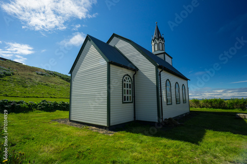 Iceland - Ancient church building of blonduos chapel on green meadow