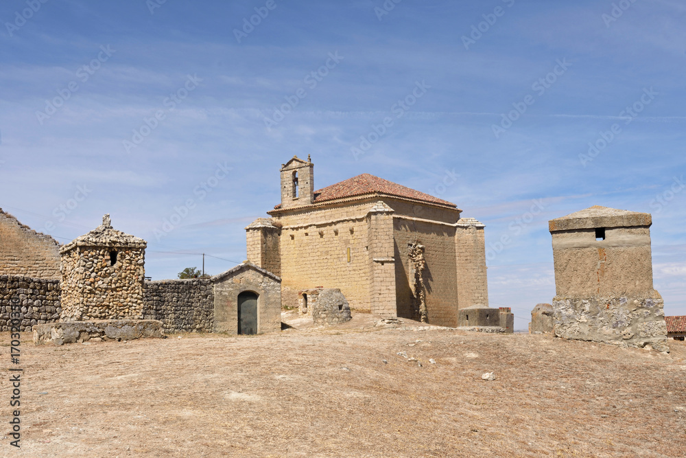 Church near castle in Ampudia, Castilla y Leon, Spain