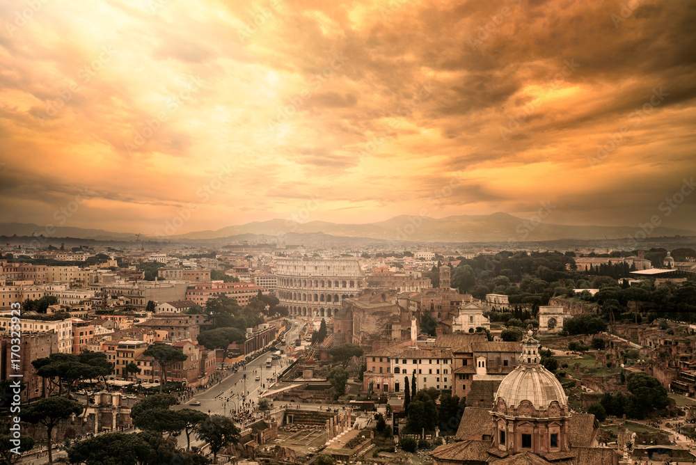 Beautiful landmark shot in Rome with city and coliseum
