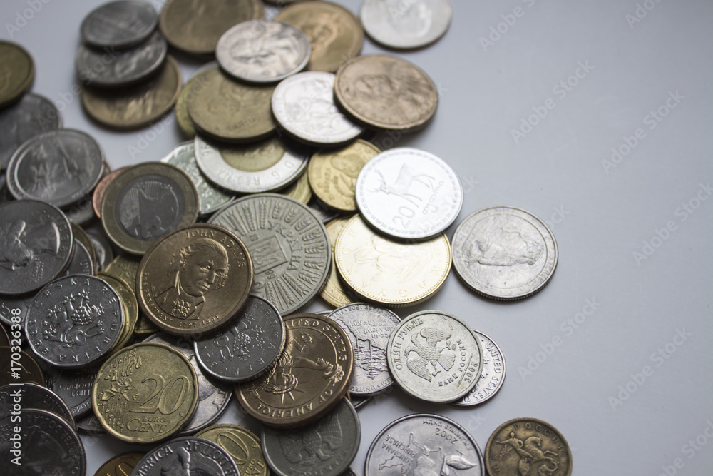 Beautiful image of coins of different countries on a white background. Beautiful image of coins of different countries on a white background.
