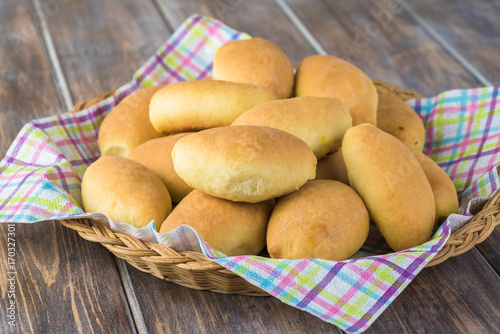 Fresh baked pie bites with egg and vegetable filling.