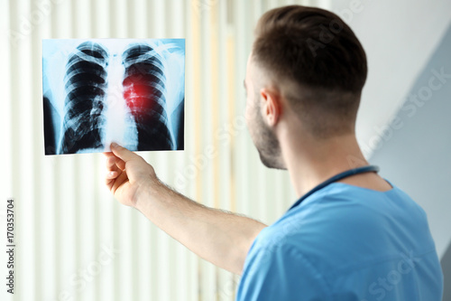 Doctor with x-ray image at ...