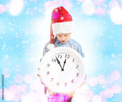 Cute little girl in Santa h...