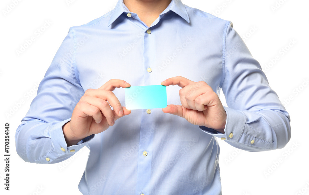 Cute teenage boy with card on white background Cute teenage boy with card on white background