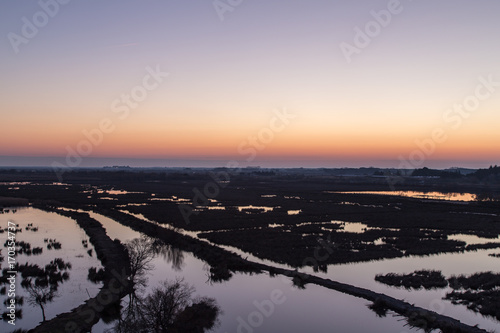 Sunrise on the Camargue ponds © philippe paternolli
