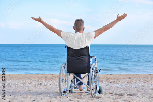 Elderly man in wheelchair o...