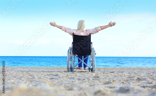 Elderly woman in wheelchair...