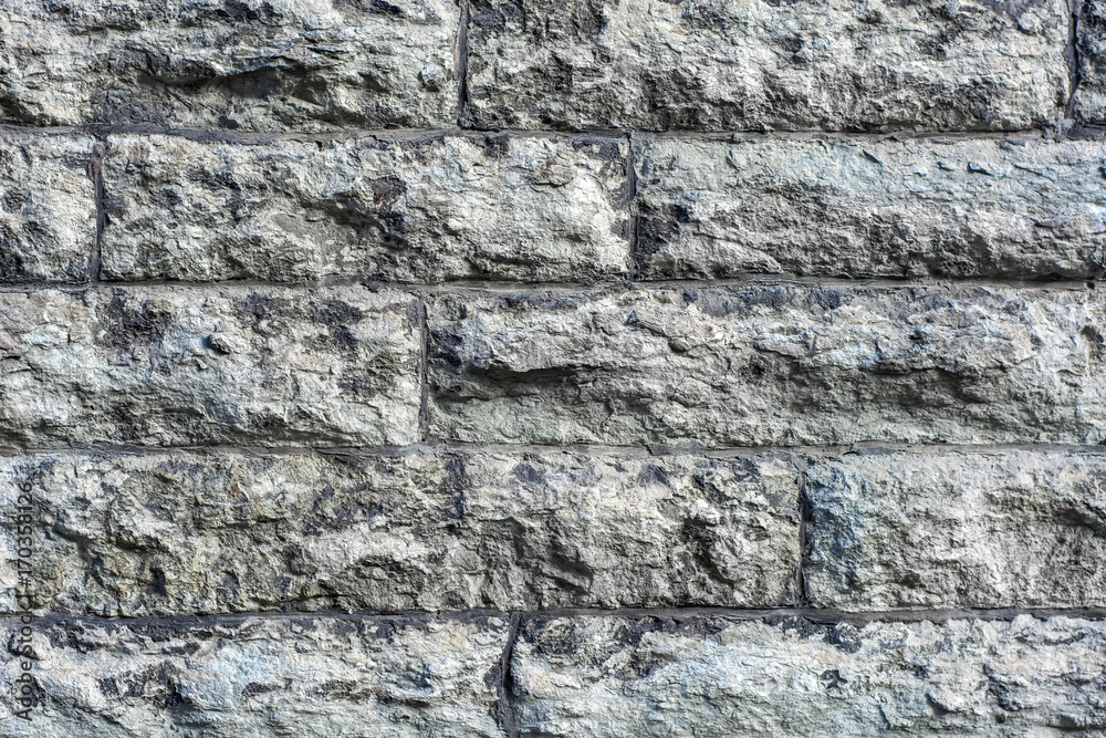 Fototapeta premium A wall of grey stone.