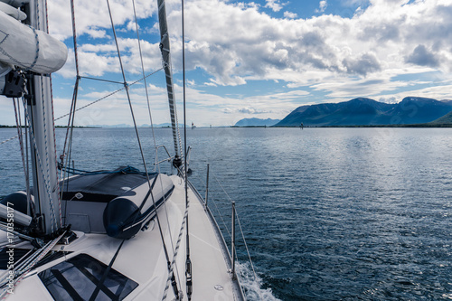 Sailing a yacht in Norway © timursalikhov