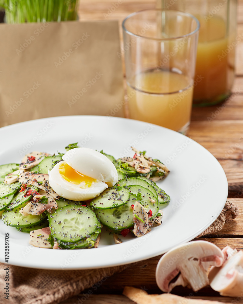Felicious and fresh salad with cucumber, eggs and seeds. Felicious and fresh salad with cucumber, eggs and seeds.