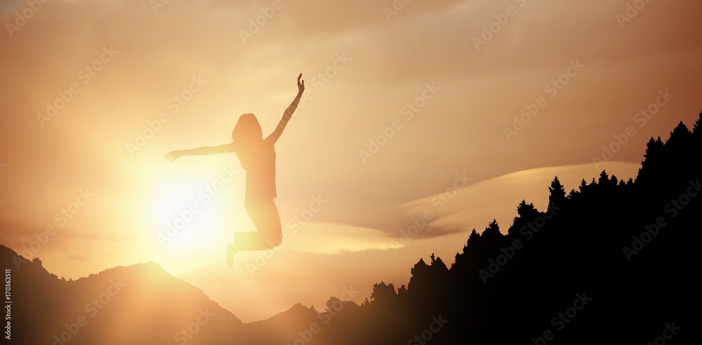 Composite image of woman jumping and smiling