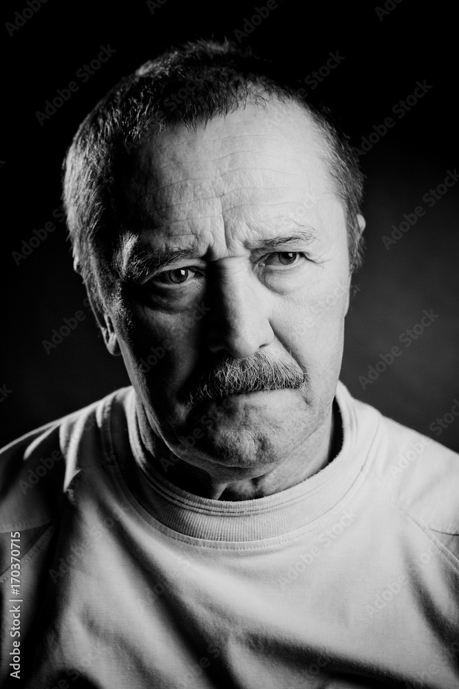 Black and white portrait of wise man with a mustache Black and white portrait of wise man with a mustache