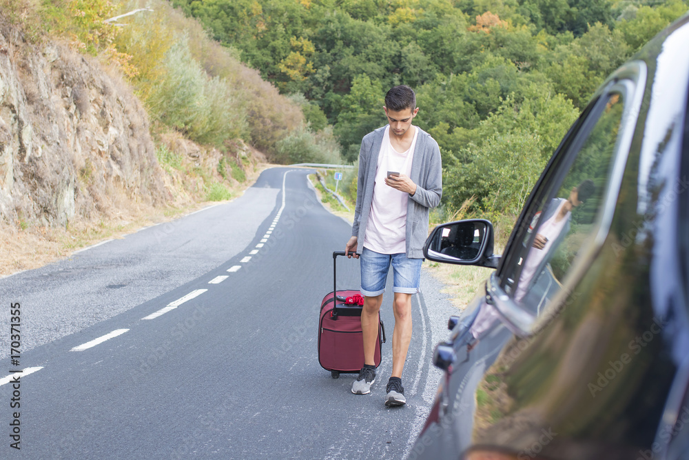 people traveling with suitcases and car