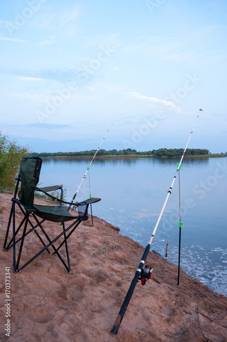 Fishing rods on shore of the lake