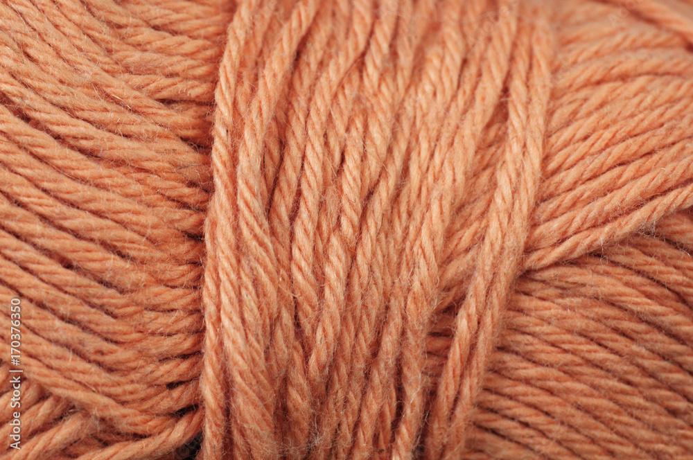 A super close up image of orange yarn A super close up image of orange yarn