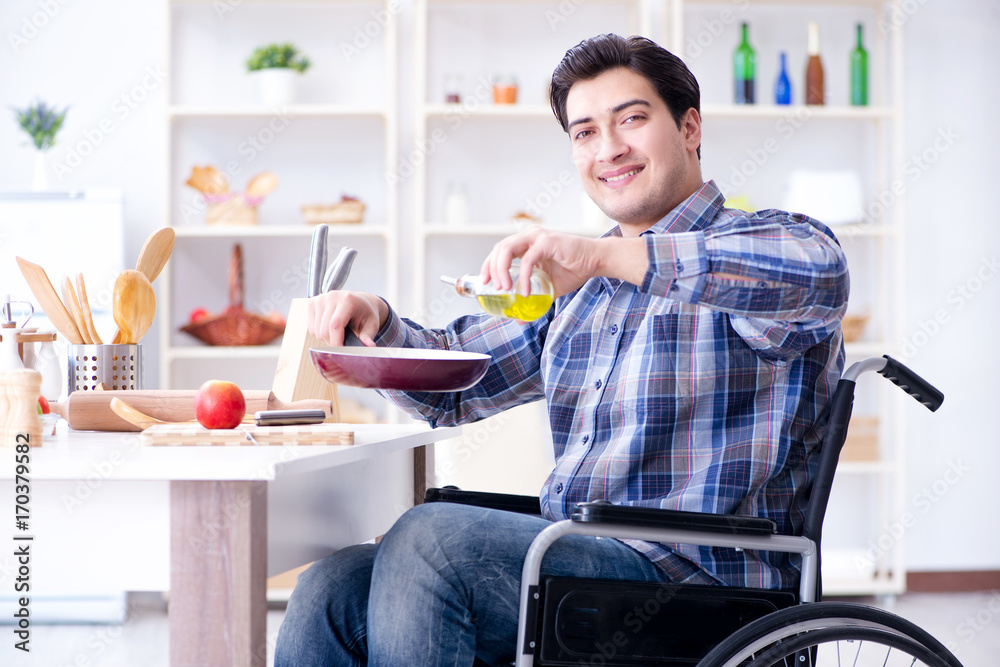 Disabled young husband frying at kitchen Disabled young husband frying at kitchen