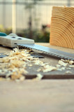 saw and wooden shavings on the boards