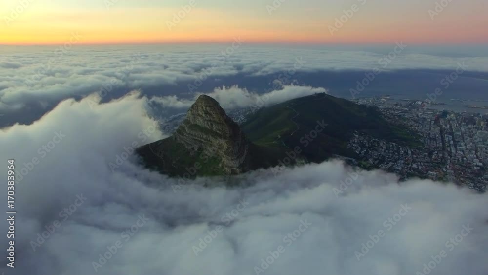 Aerial of Lion's Head, Cape Town at Sunset and Surrounded by Clouds