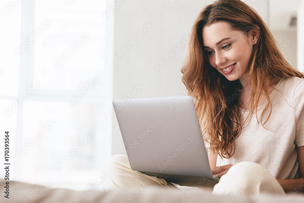 Happy amazing pretty lady using laptop computer. Happy amazing pretty lady using laptop computer.