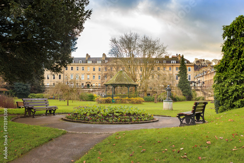 Bandstand in the Parade Gardens and Bath Abbey. Bath, Somerset, England