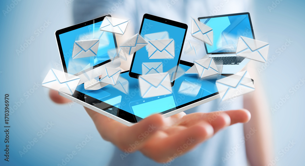 Businessman receiving e-mails on his digital devices 3D rendering Businessman receiving e-mails on his digital devices 3D rendering