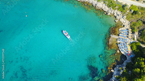 August 2017: Aerial drone photo of famous beach of Ladiko near iconic Anthony Quinn Bay, Rodos island, Aegean, Dodecanese, Greece © aerial-drone