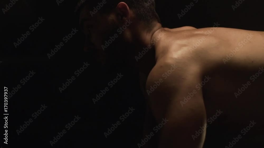 Closeup of Caucasian Male Bodybuilder Working Out With Weights in Gym. Closeup of Caucasian Male Bodybuilder Working Out With Weights in Gym.