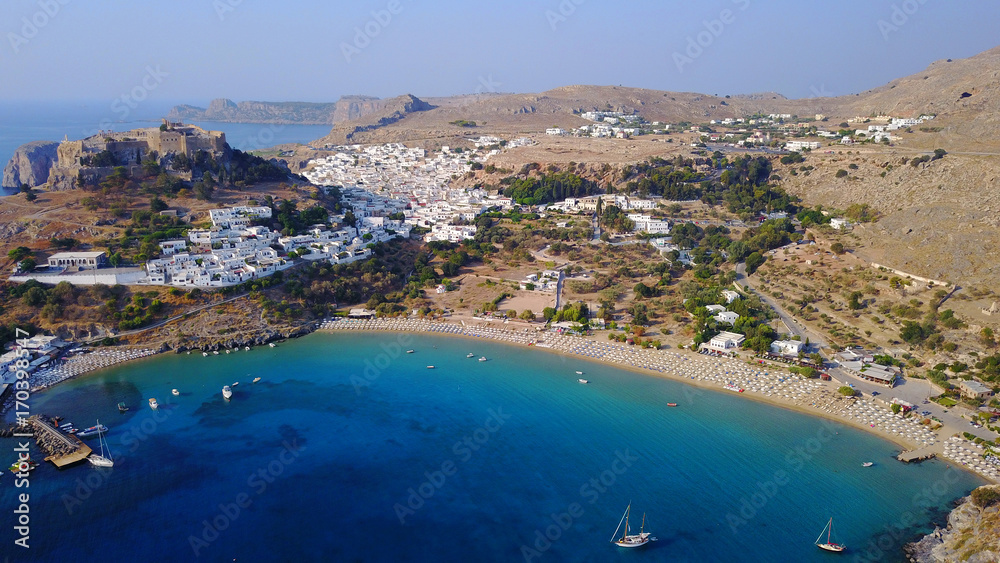 Aerial drone photo of iconic ancient Acropolis and village of Lindos, Rodos island, Aegean, Dodecanese, Greece Aerial drone photo of iconic ancient Acropolis and village of Lindos, Rodos island, Aegean, Dodecanese, Greece