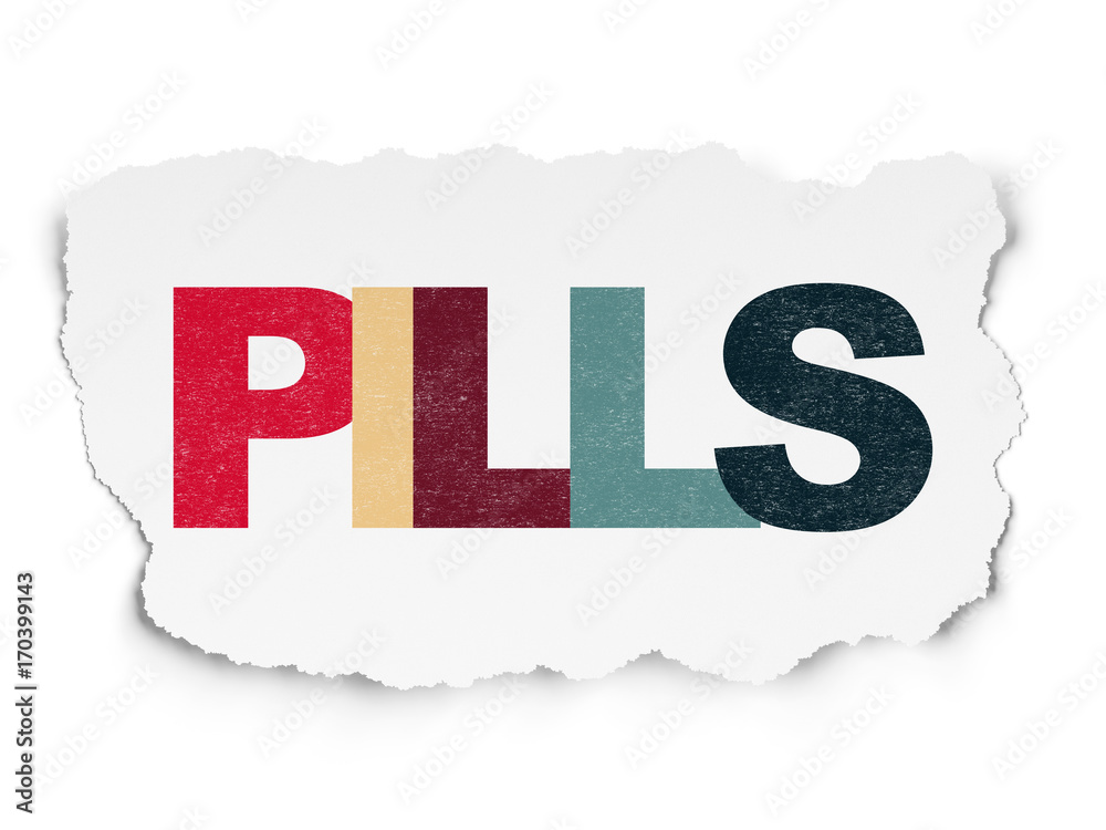 Health concept: Pills on Torn Paper background Health concept: Pills on Torn Paper background