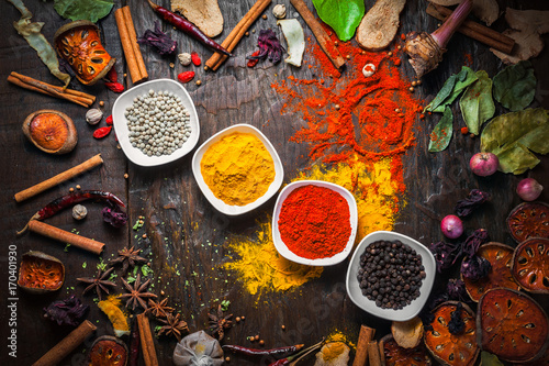 Selection of spices herbs and ingredients for cooking, Food background on wooden table, Top view, Thai cuisine.