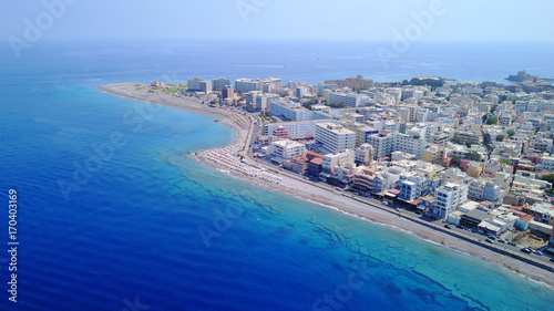 August 2017: Aerial drone photo of Rodos town peninsula with famous resorts and turquoise clear waters, Rhodes island, Aegean, Dodecanese, Greece © aerial-drone