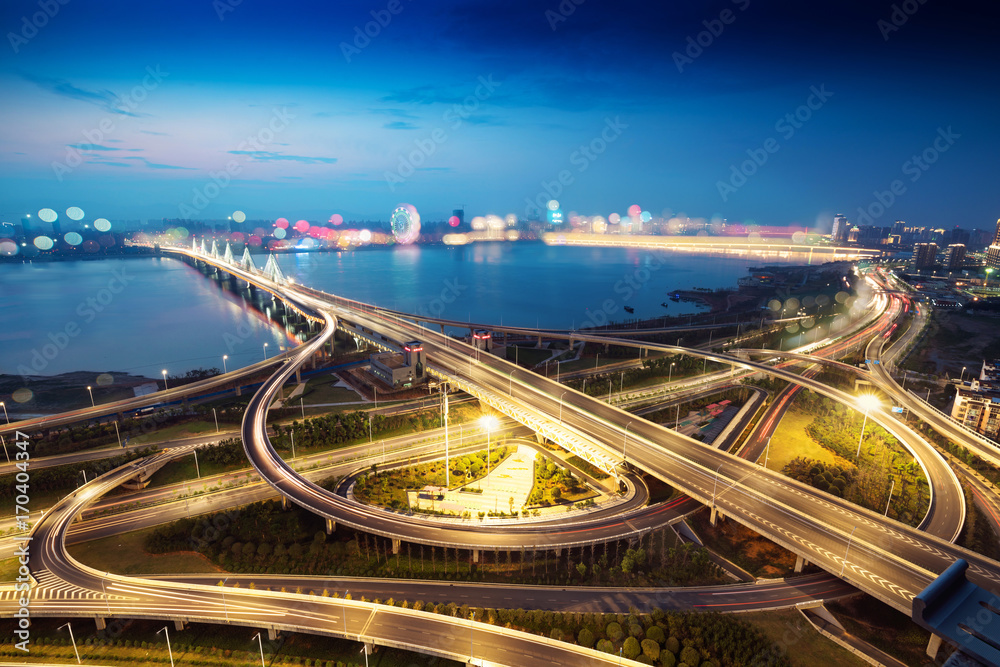 Fototapeta premium shanghai interchange overpass and elevated road in nightfall