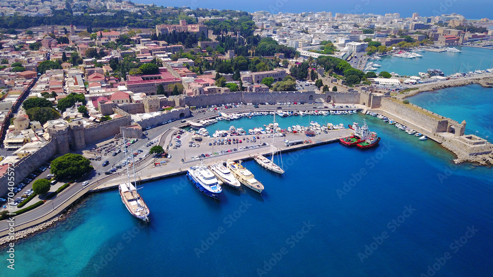 August 2017: Aerial drone photo of iconic medieval fortified old town of Rodos island, Aegean, Dodecanese, Greece