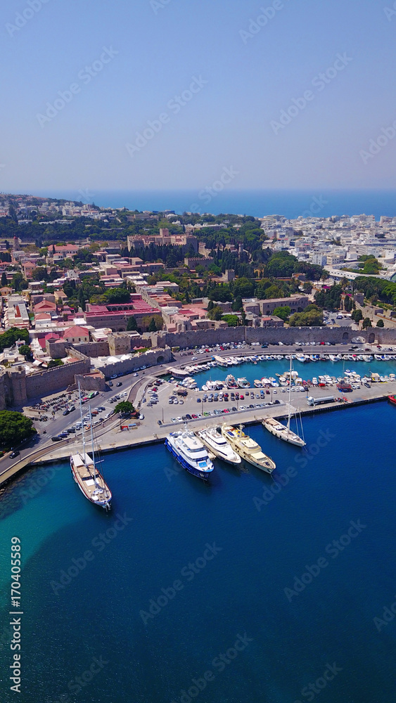 August 2017: Aerial drone photo of iconic medieval fortified old town of Rodos island, Aegean, Dodecanese, Greece
