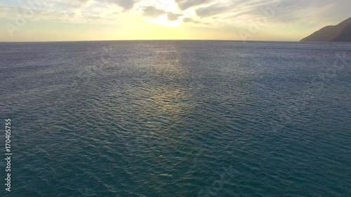 Aerial Looking up at Sunset over Vast Ocean in Cape Town, South Africa