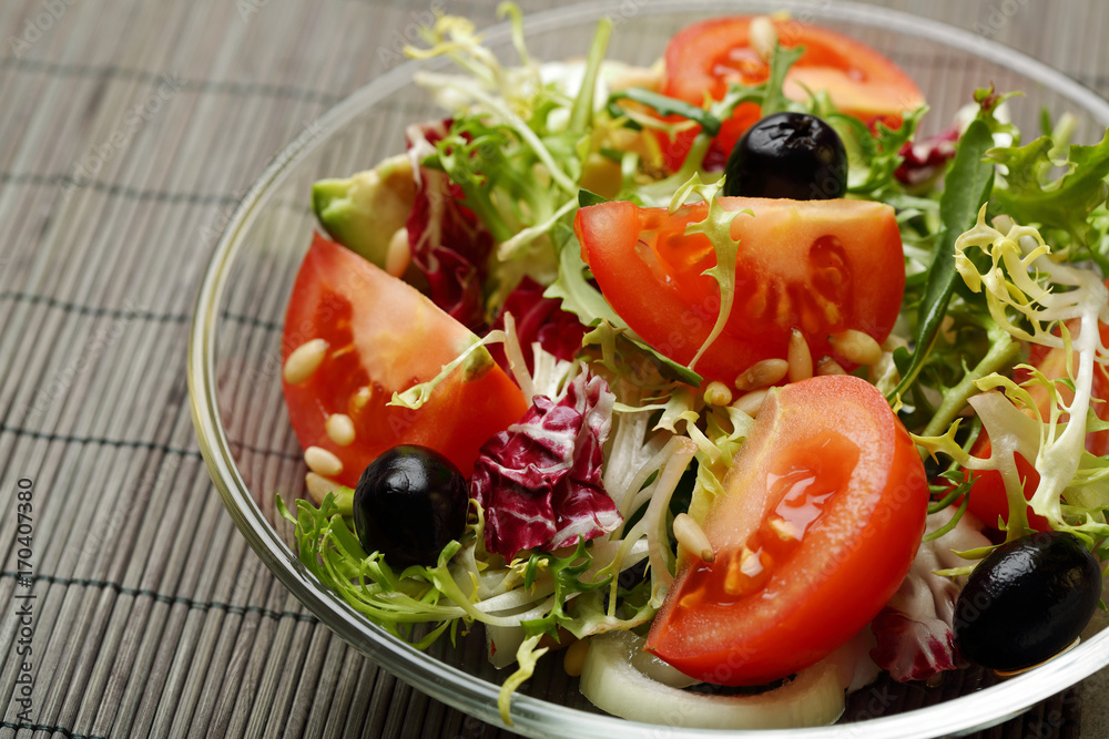 Healthy salad with tomatoes slice