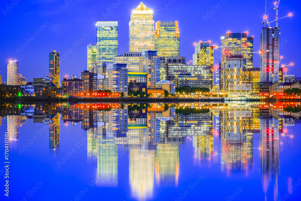 Illuminated cityscape in Canary Wharf, a major business district in east London