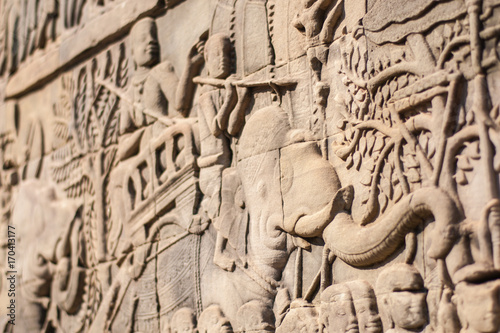Angkor Wat. Outer gallery of Bayon showing a series of bas-relief depicting historical events and daily lives of Angkorian of that time. This carvings showing battles between probably Khmer and Cham.