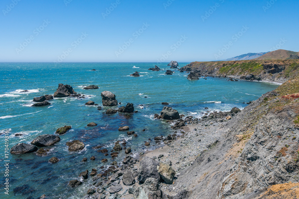 Incredible landscape of the coast. Beautiful blue sea. The waves rolled ashore and breaking on the rocks. Sonoma Coast State Park, California, USA Incredible landscape of the coast. Beautiful blue sea. The waves rolled ashore and breaking on the rocks. Sonoma Coast State Park, California, USA