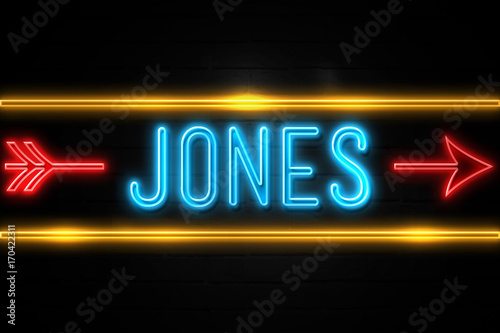 Jones  - fluorescent Neon Sign on brickwall Front view photo