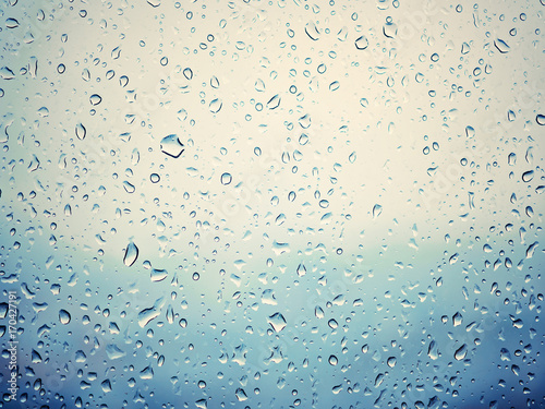 Rain in city  water drops on wet window glass