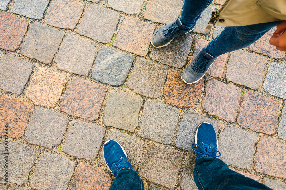 man and woman shoes on a rainy day man and woman shoes on a rainy day
