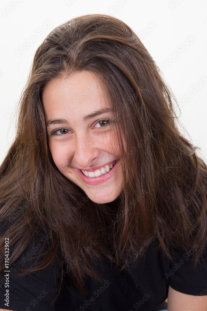 Portrait of a beautiful teenage girl isolated on white background Portrait of a beautiful teenage girl isolated on white background